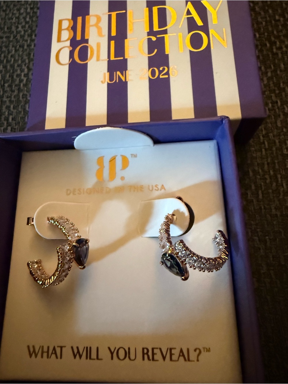 Sparkling Teardrop Hoop Earrings with Dark Blue Stone